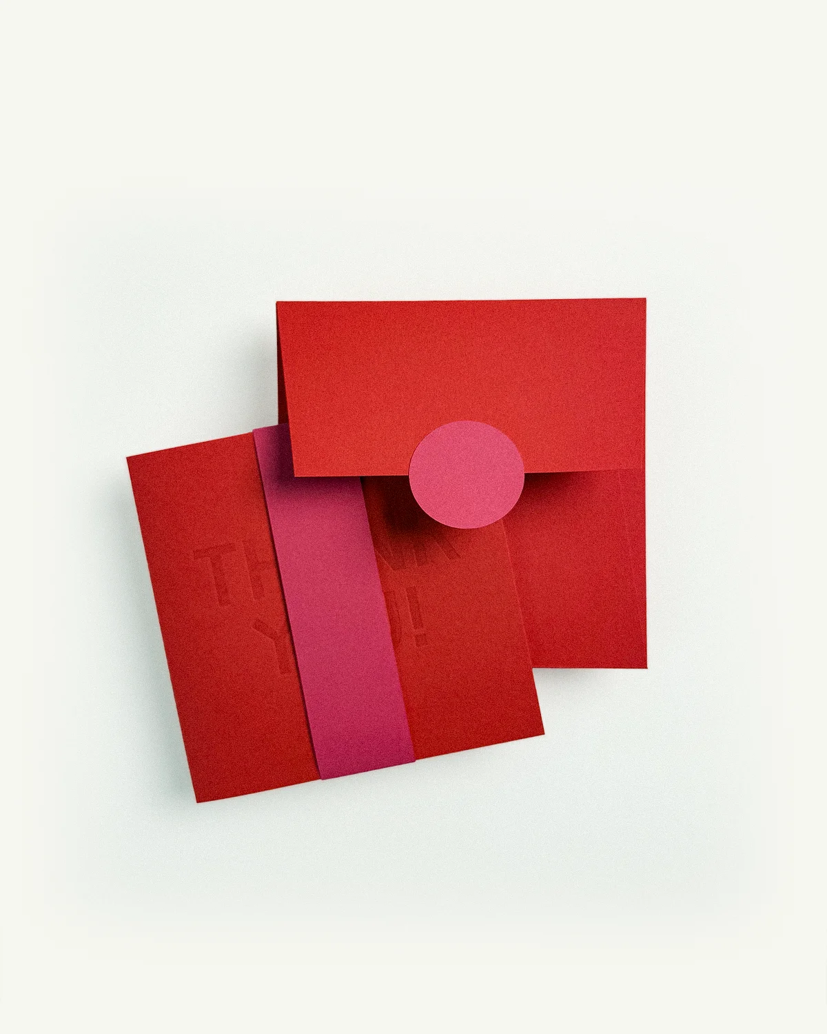 Kir Royal Suite thank-you card, belly band, and envelope in bright red.